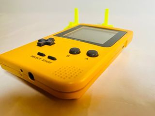 Nintendo GAME BOY POCKET Amarilla con soporte