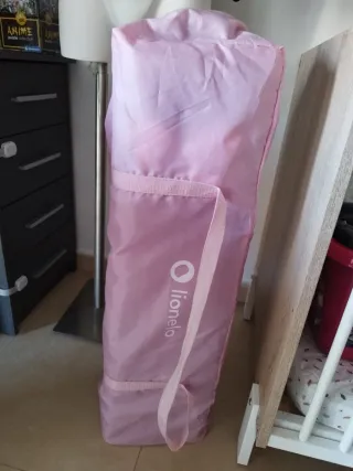 Cuna de madera y otra de viaje