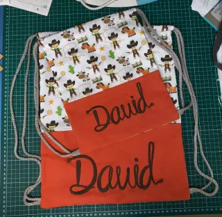2 Bolsas infantiles "David", con vaqueros