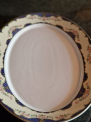 Juego vajilla porcelana floral azul y rosa