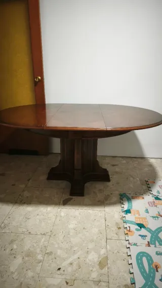 Mesa ovalada extensible de madera y cristal