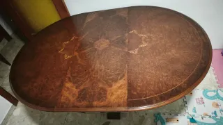 Mesa ovalada extensible de madera y cristal
