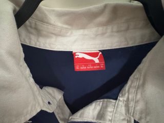 Polo Puma manga larga XL azul y blanco