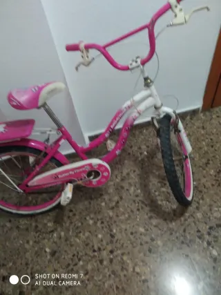 Bicicleta niña rosa y blanca
