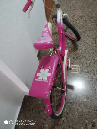 Bicicleta niña rosa y blanca