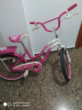 Bicicleta niña rosa y blanca