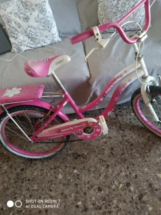 Bicicleta niña rosa y blanca