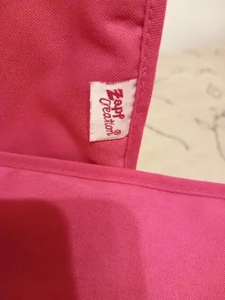 Cuna rosa para muñecas con osito