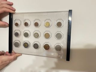 Colección monedas antiguas en marco
