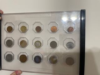Colección monedas antiguas en marco