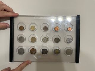 Colección monedas antiguas en marco