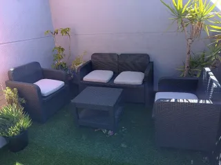 Conjunto Muebles Terraza Ratán Negro con cojines.