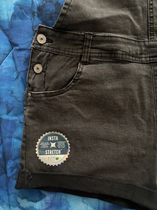 Salopette corta in denim