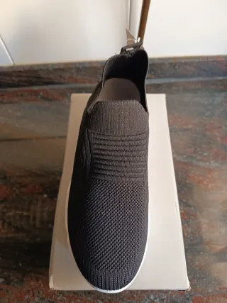 Zapatillas deportivas slip-on negras y blancas