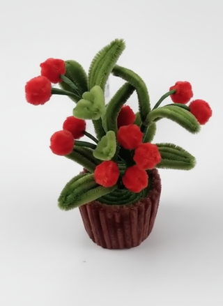 Vasetto decorativo con palline rosse