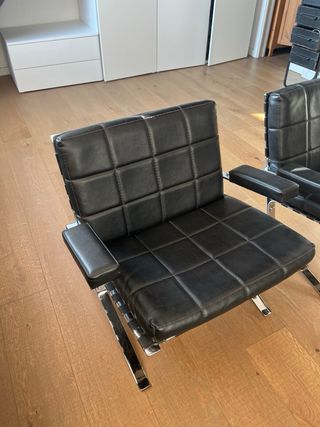 Butaca baja piel y metal negra 2 unidades x 350€