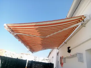 Toldo exterior rayas naranja y beige negociables