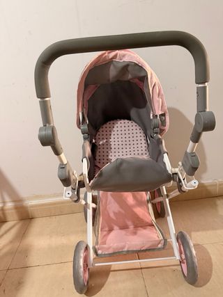 Carrito de bebé gris y rosa para niña