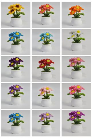 Vasetto fiori finti viola e verdi