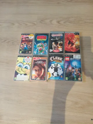 PSP Negra con funda, juegos y película