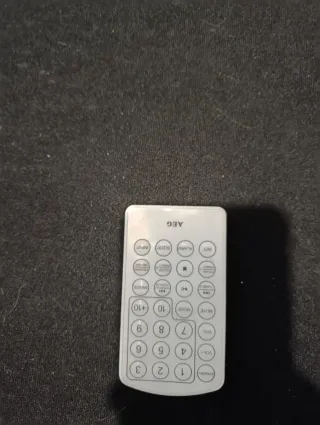 Mini cadena AEG púrpura y blanca