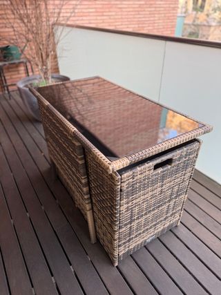 Mesa de centro de ratán y cristal para exterior