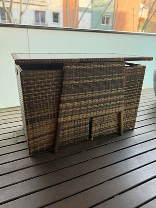 Mesa de centro de ratán y cristal para exterior