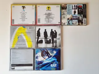 Lote 7 CDs U2