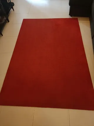 Alfombra roja de tela