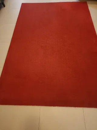 Alfombra roja de tela
