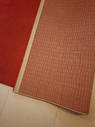 Alfombra roja de tela