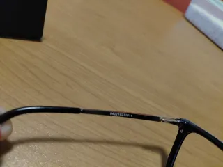 Occhiali da vista neri e oro con custodia