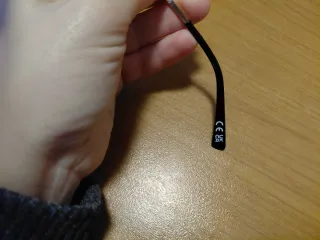 Occhiali da vista neri e oro con custodia