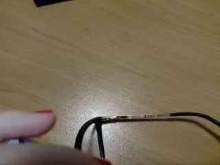 Occhiali da vista neri e oro con custodia