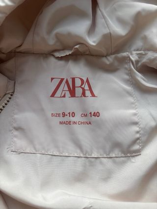 Chaleco niña beige acolchado con capucha T. 9-10