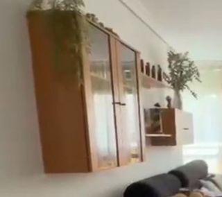 Mueble de salón madera y cristal
