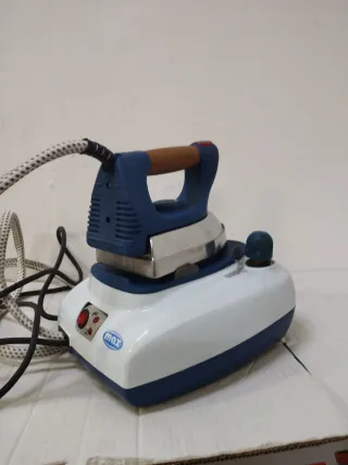 Ferro da stiro guasto con caldaia in pressione