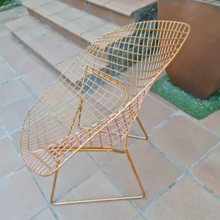Silla de forja dorada exterior