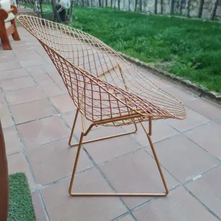 Silla de forja dorada exterior