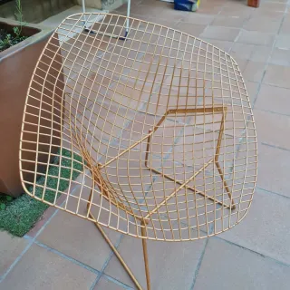 Silla de forja dorada exterior