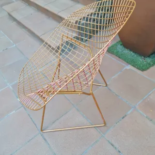 Silla de forja dorada exterior