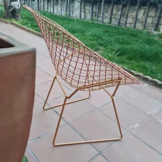 Silla de forja dorada exterior