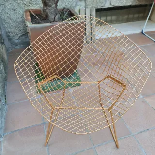 Silla de forja dorada exterior