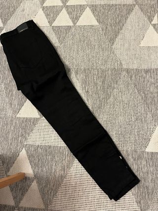 Pantalones negros mujer con botones