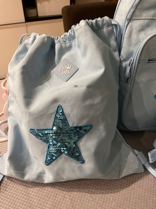 Set escolar azul con estrellas