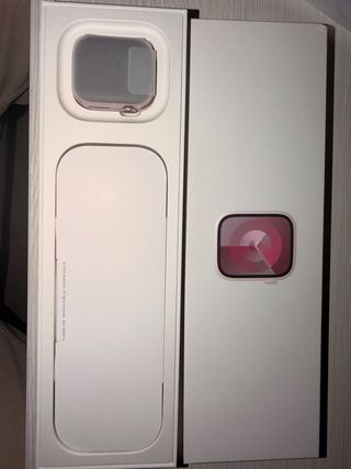 Apple Watch Series 9 41mm Rosa Claro con celular.