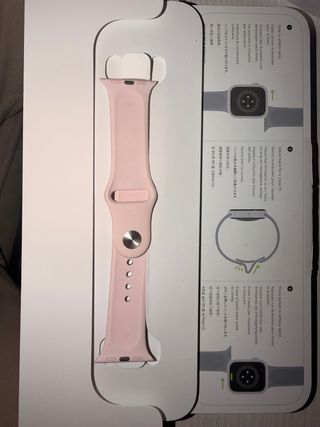 Apple Watch Series 9 41mm Rosa Claro con celular.