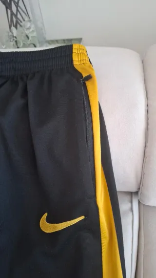 Pantalón deportivo hombre Nike negro/dorado