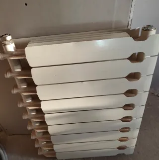 Radiador aluminio 9 elementos poco uso