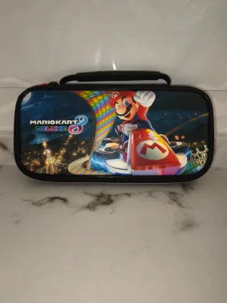 Nintendo Switch + Juegos y Accesorios